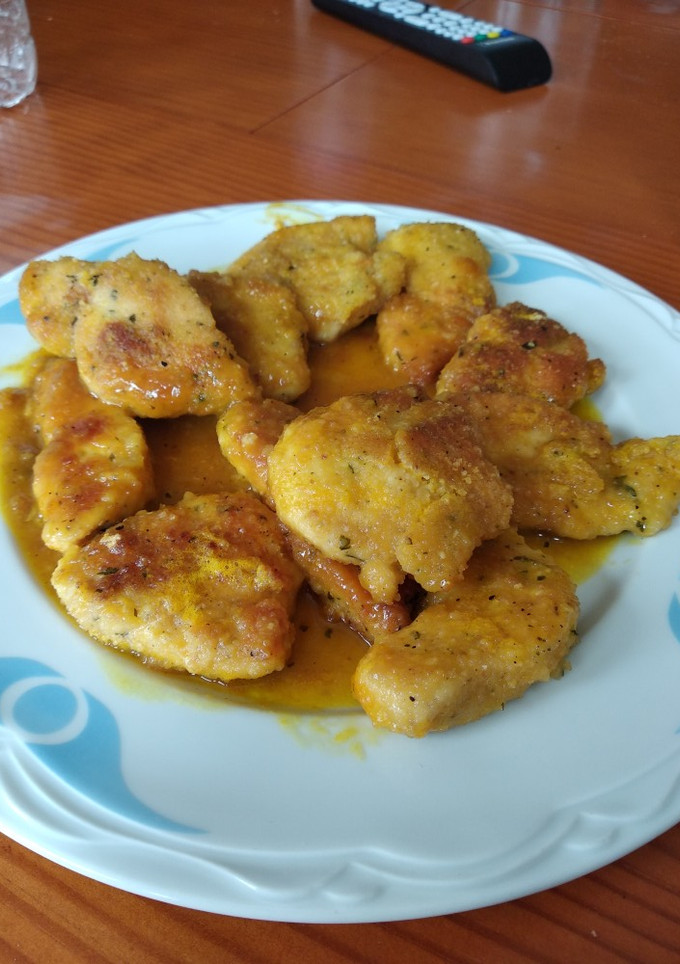 Una foto de Pechuga de pollo con zumo de naranja