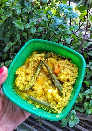 A picture of Chingri Bhapa Steamed Prawns in Mustard Popy Seeds Paste.