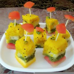A picture of Colourful fruity dhokla.