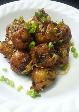 A picture of Poha dry manchurian.