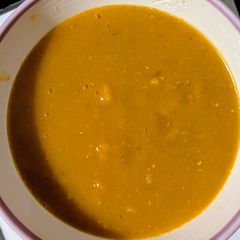 A picture of Spicy carrot and lentil soup.