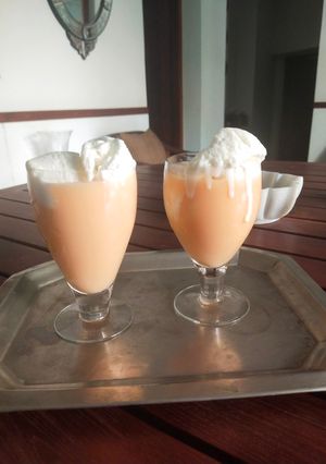 A picture of Musk Melon shake with ice cream.