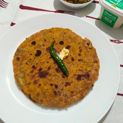 A picture of Kaddu ke paraathe (pumpkin).