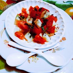 A picture of Delicious healthy watermelon and muskmelon chatpattu salad.