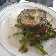 A picture of Miso butter mushroom with asparagus broccoli & rice.
