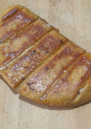 A picture of Dominos style stuffed garlic bread.