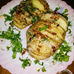 A picture of Mini Hasselback Potatoes with Chive Butter.