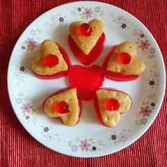 A picture of Heart shape Malpua with Strawberry flavour Jelly.