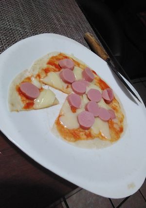 Una foto de Pizza de tortilla