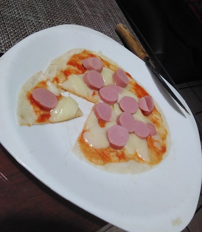 Una foto de Pizza de tortilla
