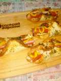 Aperitivo de pan tostado con pancho