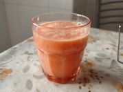 Una foto de batido melocoton y naranjas