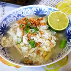 A picture of Rice and Chicken soup.
