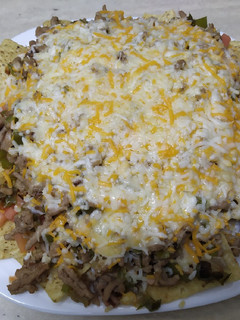 Una foto de Nachos estilo México