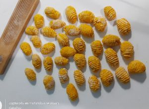 Una foto de Gnocchis de calabaza naranja