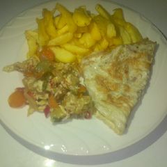 A picture of Potatoes, omelette and vegetables sauce.