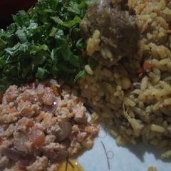 A picture of Rice and Beans jollof with egg source.