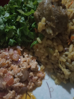A picture of Rice and Beans jollof with egg source.