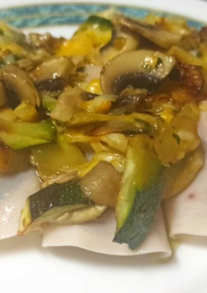 Una foto de Rollitos de calabacín, champiñones y queso