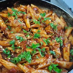 A picture of Red sauce pasta.