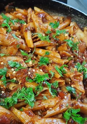 A picture of Red sauce pasta.