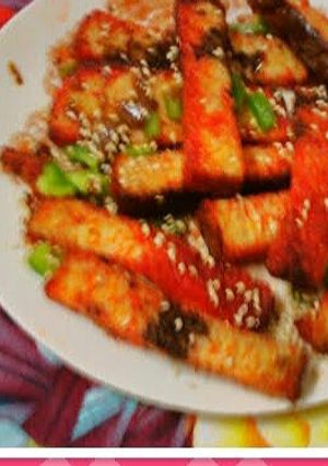 A picture of Shezwan bread sticks.