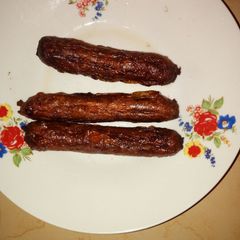 A picture of Fried sausages.