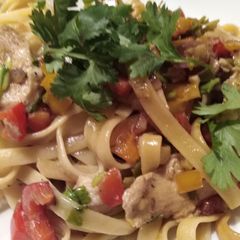 A picture of Fettuccine chicken/ tofu with tequila.