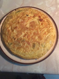 Una foto de Tortilla de patatas con jamón y queso