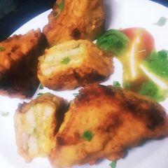 A picture of Layered Masala Bread Pieces (Pakora).