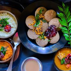 Multigrain Idli, Garlic Chutney, Coconut Chutney, Sambhar A picture of Multigrain Idli, Garlic Chutney, Coconut Chutney, Sambhar.