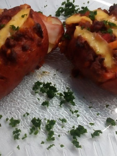 Una foto de Papas Rellenas, con queso, cebolla de verdeo y jamón