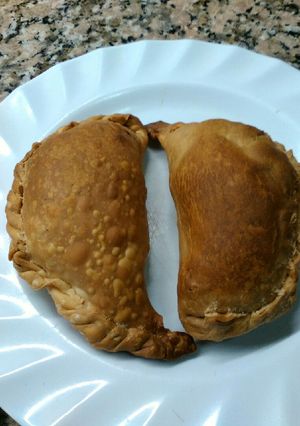 Una foto de Empanadas de jamón, 4 quesos, nueces y cebollas caramelizadas