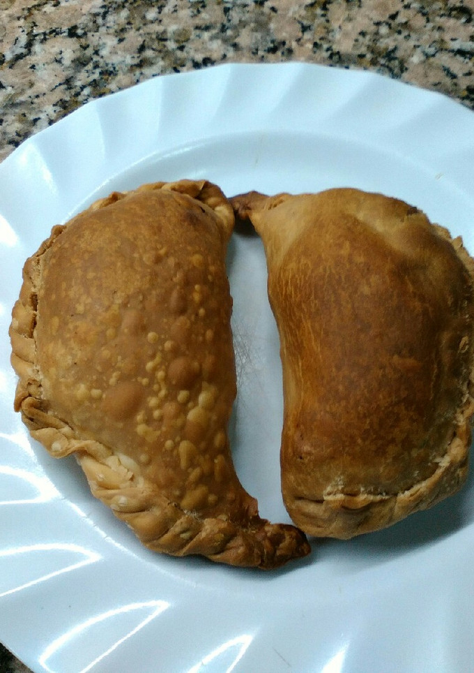 Una foto de Empanadas de jamón, 4 quesos, nueces y cebollas caramelizadas