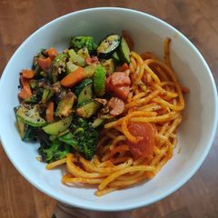 A picture of Spaghetti Pasta and stir fry veggies.