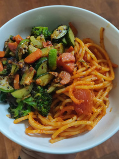 A picture of Spaghetti Pasta and stir fry veggies.