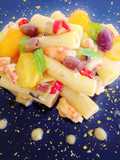 Tortiglioni con gamberi, crema di melanzane e datterini