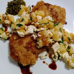 A picture of Crispy pork chops with apple, feta and balsamic.