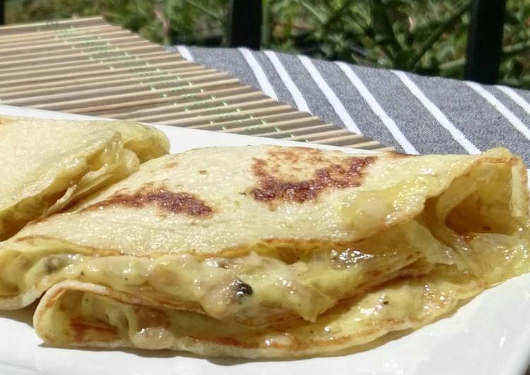 Crepes de champiñones con bechamel al curry