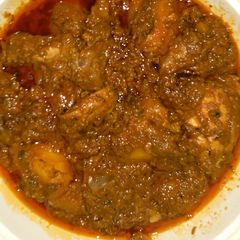 A picture of Smoked chicken curry.