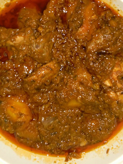 A picture of Smoked chicken curry.