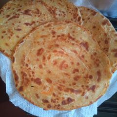 A picture of Chapatis with carrots.