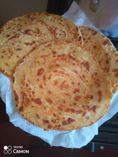 A picture of Chapatis with carrots.