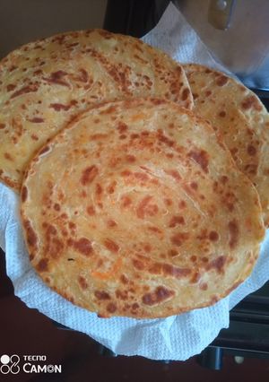 A picture of Chapatis with carrots.