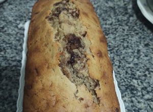 Una foto de Budín de banana con chocolate 🍫 o con frutos secos 🫐