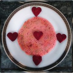 A picture of Beetroot uttappam.