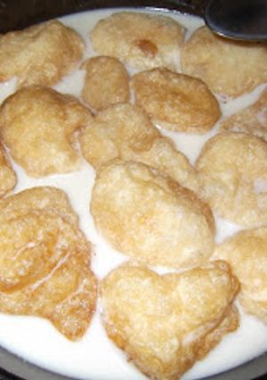 Una foto de Buñuelos con leche
