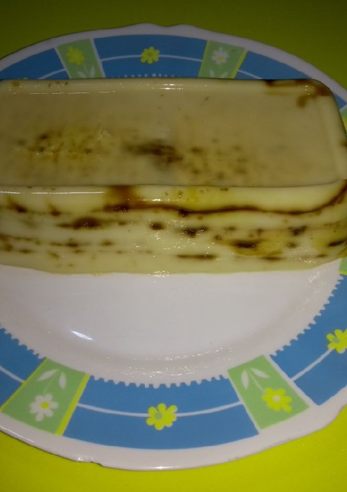 Una foto de Postre Natilla de café y galletas