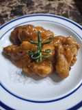 Trocitos de cerdo con salsa de piña