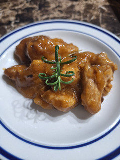 Una foto de Trocitos de cerdo con salsa de piña